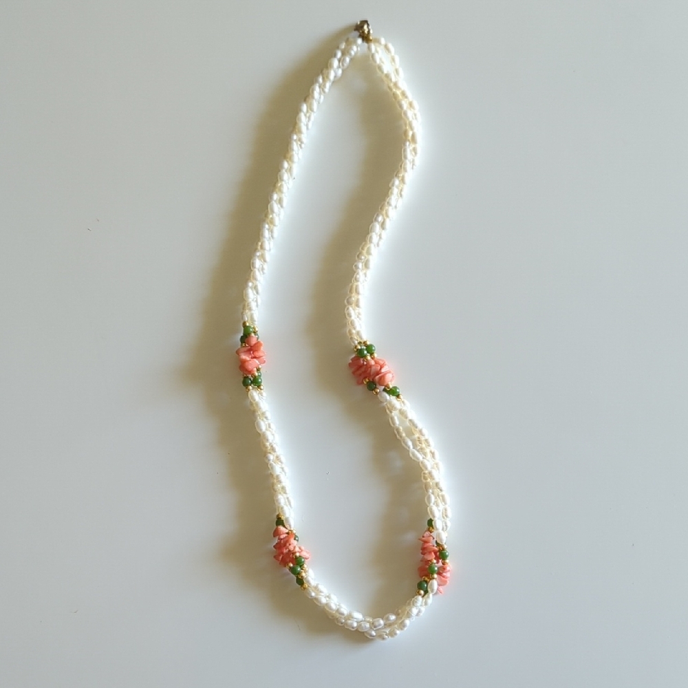 Handcrafted White Beaded Necklace with Coral Flower Accents